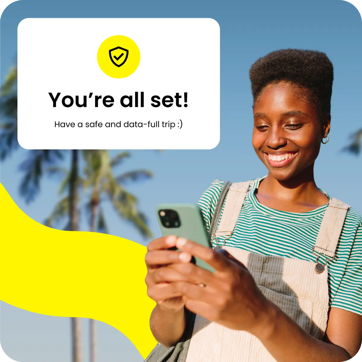 A smiling woman enjoys a fully set Saily eSIM plan.