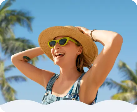 A smiling woman on vacation.