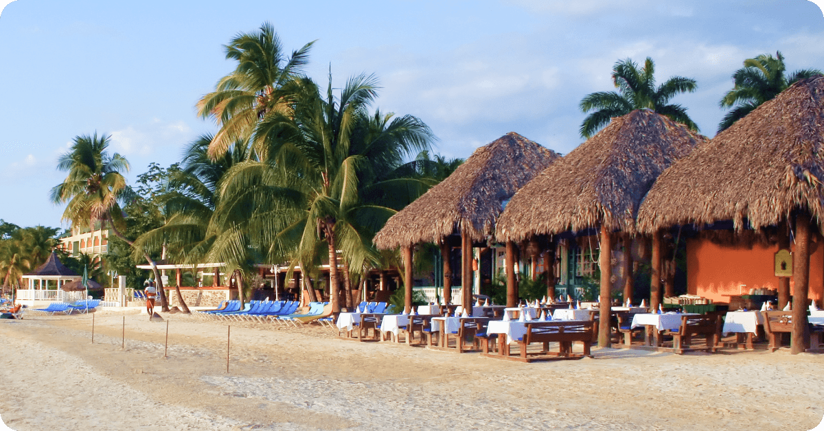 A Jamaican restaurant with outdoor seating.