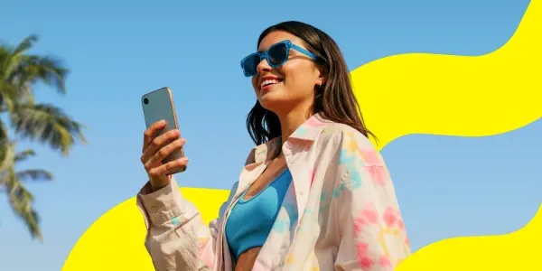 A woman uses Saily’s data usage calculator.