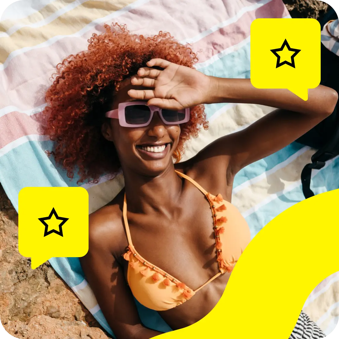 A happy woman lies on the beach after posting a Saily review.